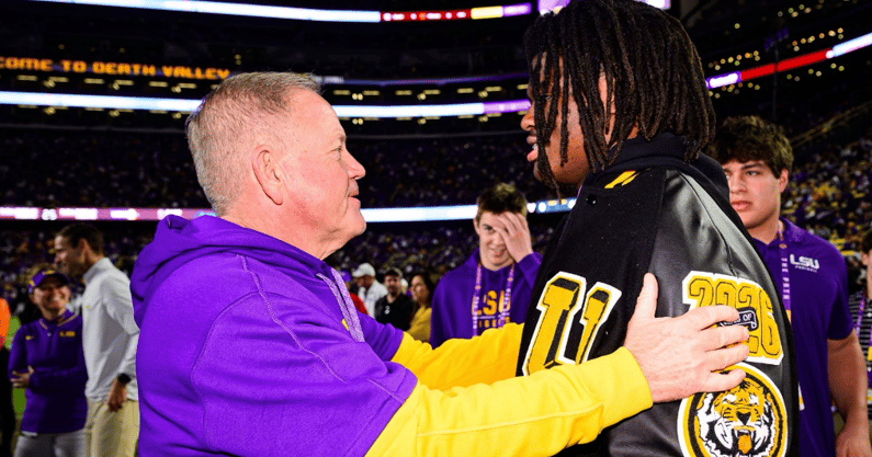 LSU HC Brian Kelly and 5-star Lamar Brown speak on the sidelines of Tiger Stadium (Photo: Lamar Brown)